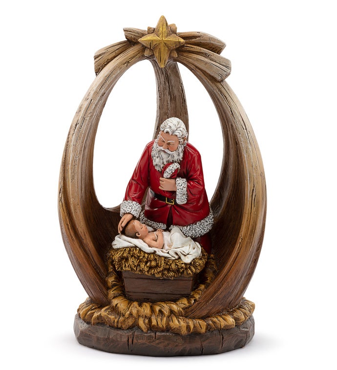 Santa With Baby Jesus in Crech